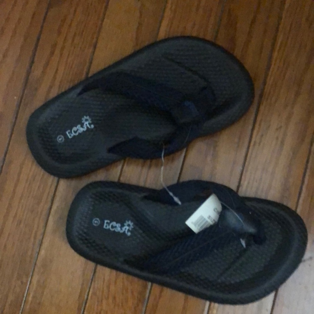 Ocean Current Black Kids Flip Flops